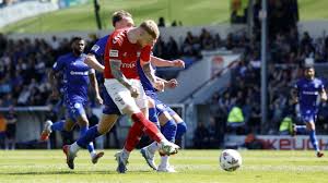 York beat Rochdale to promotion from National League in 103rd min - explaining playoffs, rule-change demands, what's next