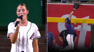 Carroll's girlfriend steals show with anthem, then Carroll steals a HR!