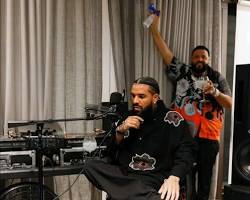 Hình ảnh về DJ Khaled and Drake working in a music studio