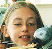 Lea Ruth Artz, Susan&#39;s younger daughter, was 11-years-old when she wrote this story of her experiences with Mohali, our African Grey parrot. - lea_and_mo-Thumbnail