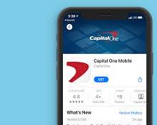 Image of person holding a phone with the Capital One app open