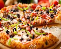 صورة طريقة تحضير عجينة البيتزا العراقية