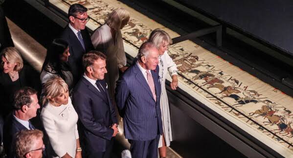 Macron and King Charles III view Bayeux Tapestry in London, hailing it as symbol of Franco-British ties; 1,000-year-old artwork on loan for 10-month exhibition