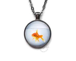 necklace with a goldfish pendantの画像