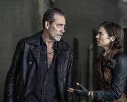 Image of Maggie and Negan standing on a rooftop in New York City, surrounded by zombies