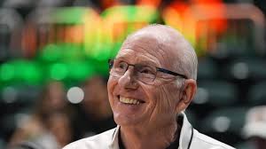 Miami unfurls a banner to honor retired coach Jim Larrañaga, who led the 'Canes to a Final Four