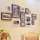 Black multi picture frames wall