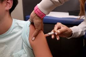 Trump order endorses plan to halve vaccines recommended for children