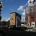 City's last tenement an island awash in modernity