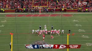 Harrison Butker kicks a field goal during the Chiefs game