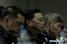 Manila Police District Chief Rodolfo Magtibay (C) is questioned by the ... - 3424064104