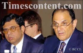 Britannia Industries Ltd chairman Nusli Wadia (right) and chief financial officer Durgesh Mehta address - Nusli-Wadia-Durgesh-Mehta