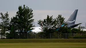 Cargo plane overshoots runway at Miami International Airport