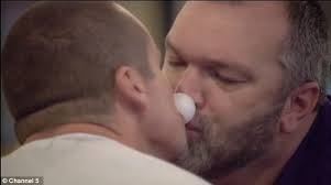 Hopefully his footy mates aren&#39;t watching: Neil &#39;Razor&#39; Ruddock and Ryan Moloney get extremely close as they ... - article-2259003-16CE20AA000005DC-531_634x354