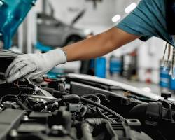 Mechanic fixing a car