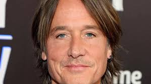 Keith Urban's lonely ACM appearance is a major contrast to last year's loved up moment with ex Nicole Kidman