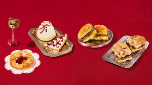 Starbucks 2026 holiday drinkware collection featuring Bearista and Christmas Tree cups
