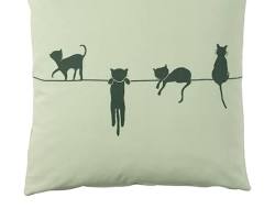 cushions with various cat motifsの画像