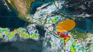 National Hurricane Center Watching Southwest Caribbean For Tropical 
Development