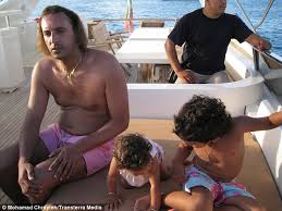 Image result for hillary clinton with gaddafi son