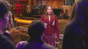 Aimee Lou Wood Wastes No Time In Roasting ‘SNL’s Teeth Sketch Ahead Of ‘SNL UK’ Hosting Duties