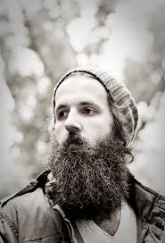 William Fitzsimmons takes brooding folk music to an entirely new, much more self-aware level. Mixing electronic drum beats with the soulful picking of an ... - WF-Derivatives-close-up-green-hat-gray-jacket-photo-credit-Erin-Brown-hi-res