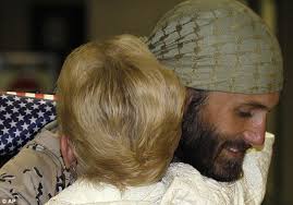 Home: Matthew VanDyke hugs his mother Sharon as he arrives in an airport near Baltimore, Maryland after fighting with rebel forces to end Muammar Gaddafi&#39;s ... - article-2058216-0EAF37F100000578-960_634x443