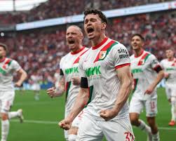 Augsburg net last-gasp penalty to down dominant Bayer Leverkusen