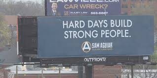 A personal injury attorney has been putting up 60 billboards with positive messages. Here’s why.