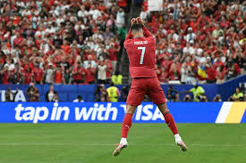 Ronaldo double fires Portugal as Ghana thwarts England