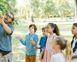 Image of Summer camp counselor with kids