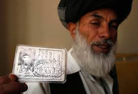 Pashtun tribal elder Khaki Jan Zadran, 55, shows his identity card from when he was in the Mujahedeen movement against Soviet forces. - 090922-Khaki-Jan-Zadran-hmed-12a.grid-6x2