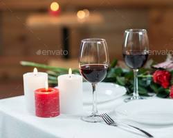 Imagem de Romantic Dinner Table Setting with Wine Decanter