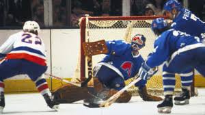 Garrett, Sportsnet analyst, former goalie, dies at 74