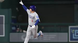 Alex Bregman celebrates after hitting three home runs for the Chicago Cubs against the Washington Nationals