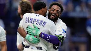 Junior Caminero celebrates after hitting a walk off home run for the Tampa Bay Rays