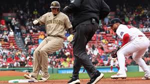 Machado's well-timed kick helps Padres rally to beat Boston