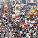 With three chariots, elephants trucks,
