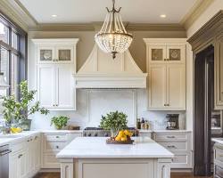 Image of kitchen with a classic design, featuring ornate hardware and a chandelier