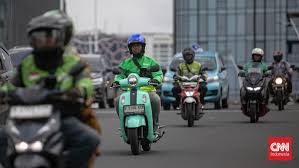 Potongan Tarif Ojol Grab Mulai Juli, Masyarakat Mengharapkan Lebih Banyak Kemudahan