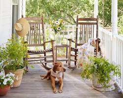 Image of happy homeowner relaxing on their porch