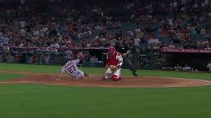 Astros take lead in 10th on Angels' throwing error