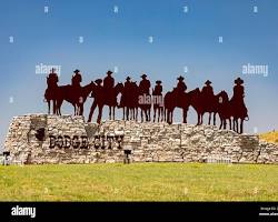 Image of Wyatt Earp riding horseback through the open plains surrounding Dodge City, his silhouette framed against a setting sun