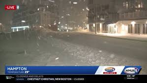 Snow, strong winds seen at Hampton Beach as nor'easter moves through