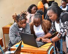 Image of women coding or participating in online activism