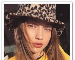 Image of Gigi Hadid wearing an animal print bucket hat