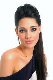 Former Miss Universe (2003) Amelia Vega, hosts “Suegras,” an Azteca America reality show in which 12 women, six “ready to marry” men and their mothers share ... - hmprAmeliaVega