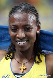 Abeba Aregawi of Sweden celebrates after Women&#39;s 1500m Final in Day 6 of the 14th IAAF World Athletics Championships Moscow 2013 at Luzhniki Stadium in ... - 132635489_11n