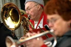 Bill Owensby blows into his baritone horn as he ... - 46513-d