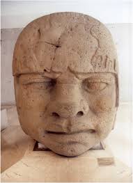 Probably a depiction of a ruler. The featured were drilled emphasizing the eyes, nose and the strong mouth. Jaguar paws are draped over the head probably ... - headn51316556307677